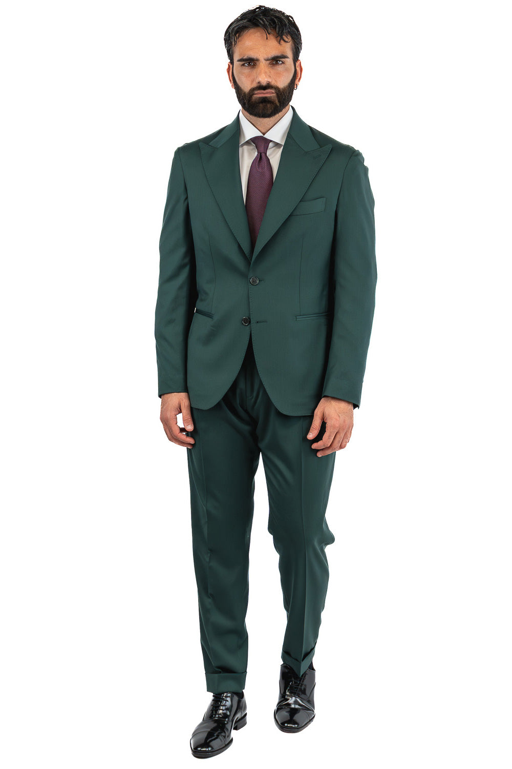 Abito uomo Monopetto Verde bottiglia fresco lana super 110's Tessuti in esclusiva Sartoria Carillo completamente sfoderato con Rever a lancia e tasche a filetto