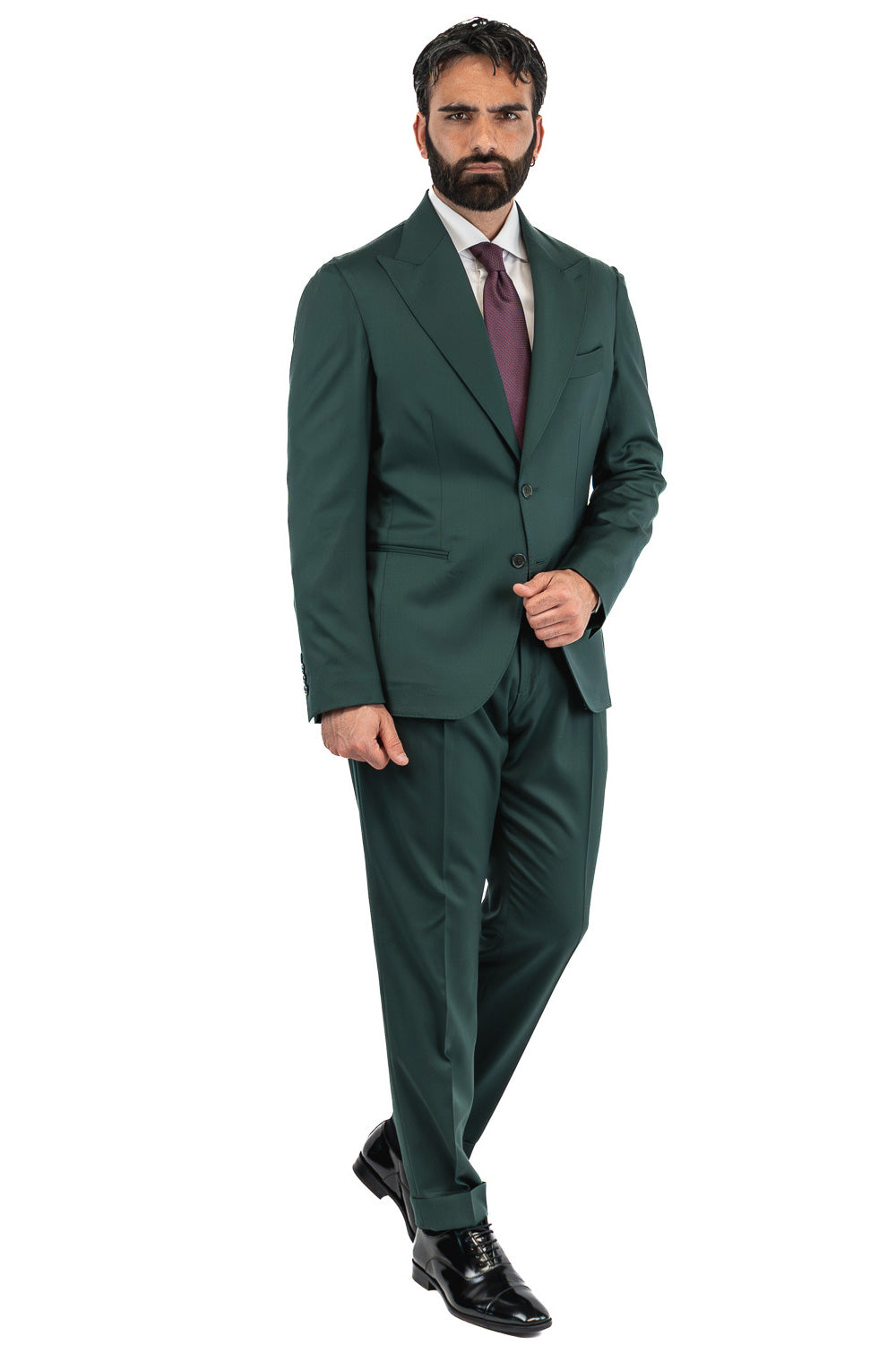 Abito uomo Monopetto Verde bottiglia fresco lana super 110's Tessuti in esclusiva Sartoria Carillo completamente sfoderato con Rever a lancia e tasche a filetto