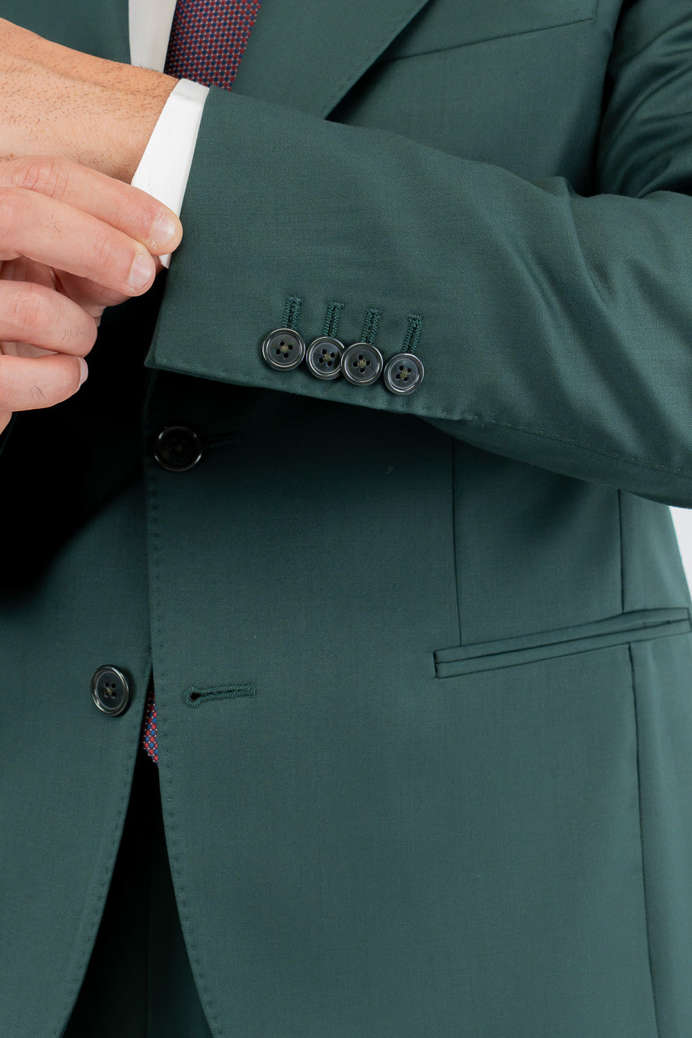 Abito uomo Monopetto Verde bottiglia fresco lana super 110's Tessuti in esclusiva Sartoria Carillo completamente sfoderato con Rever a lancia e tasche a filetto