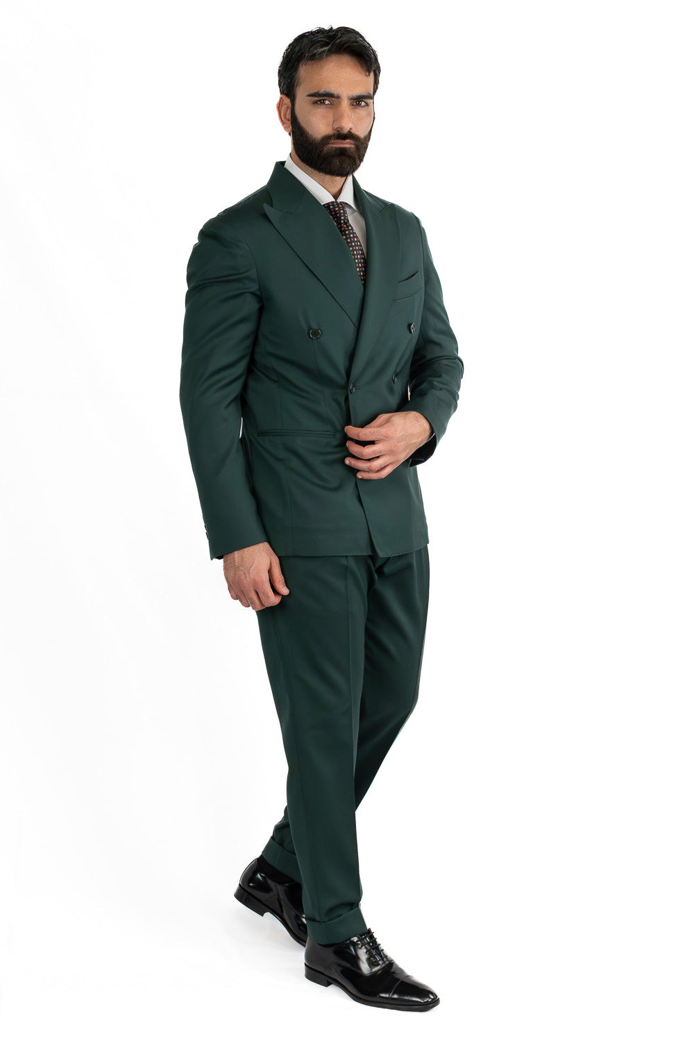Abito uomo Doppiopetto Verde Bottiglia fresco lana super 110's Tessuti in esclusiva Sartoria Carillo completamente sfoderato con Rever a lancia e tasche a filetto
