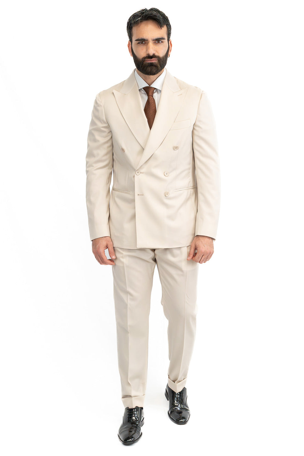 Abito uomo Doppiopetto beige fresco lana super 110's Tessuti in esclusiva Sartoria Carillo completamente sfoderato con Rever a lancia e tasche a filetto