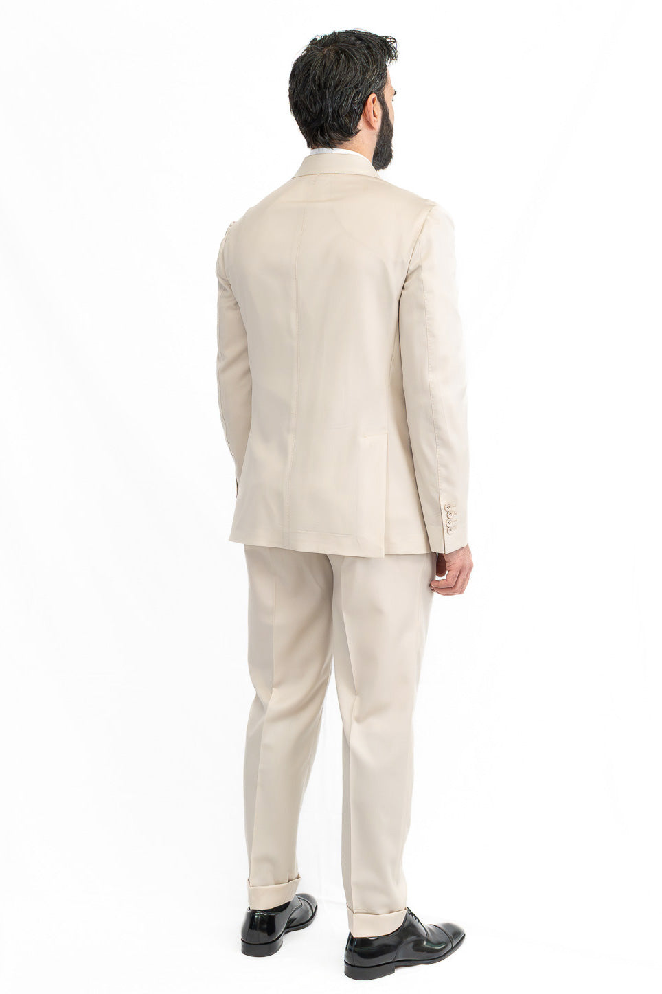 Abito uomo Doppiopetto beige fresco lana super 110's Tessuti in esclusiva Sartoria Carillo completamente sfoderato con Rever a lancia e tasche a filetto