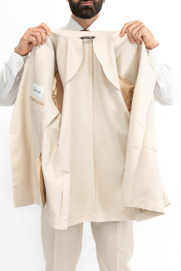 Abito uomo Doppiopetto beige fresco lana super 110's Tessuti in esclusiva Sartoria Carillo completamente sfoderato con Rever a lancia e tasche a filetto