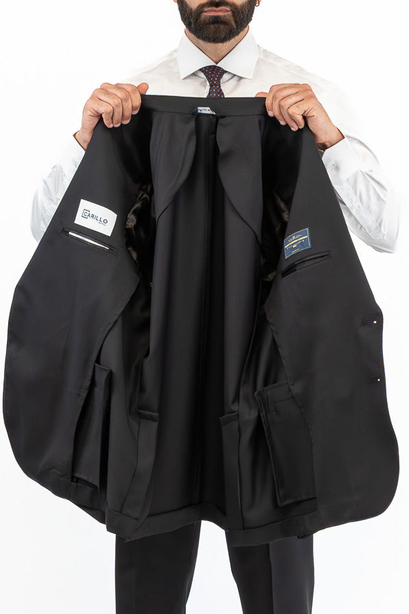 Abito nero monopetto uomo fresco lana super 130's  TessutiVitale Barberis Canonico completamente sfoderato con Rever a lancia e tasche a filetto
