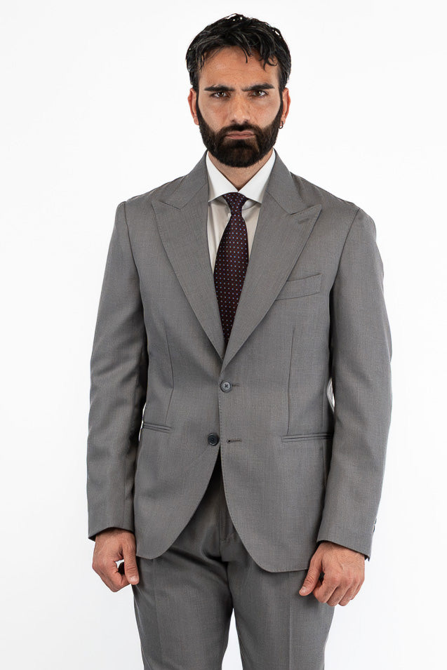 Abito grigio monopetto uomo fresco lana super 120's  completamente sfoderato con Rever a lancia e tasche a filetto