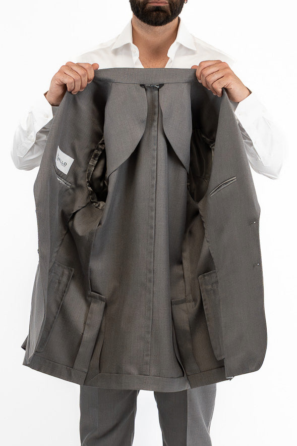 Abito grigio monopetto uomo fresco lana super 120's  completamente sfoderato con Rever a lancia e tasche a filetto
