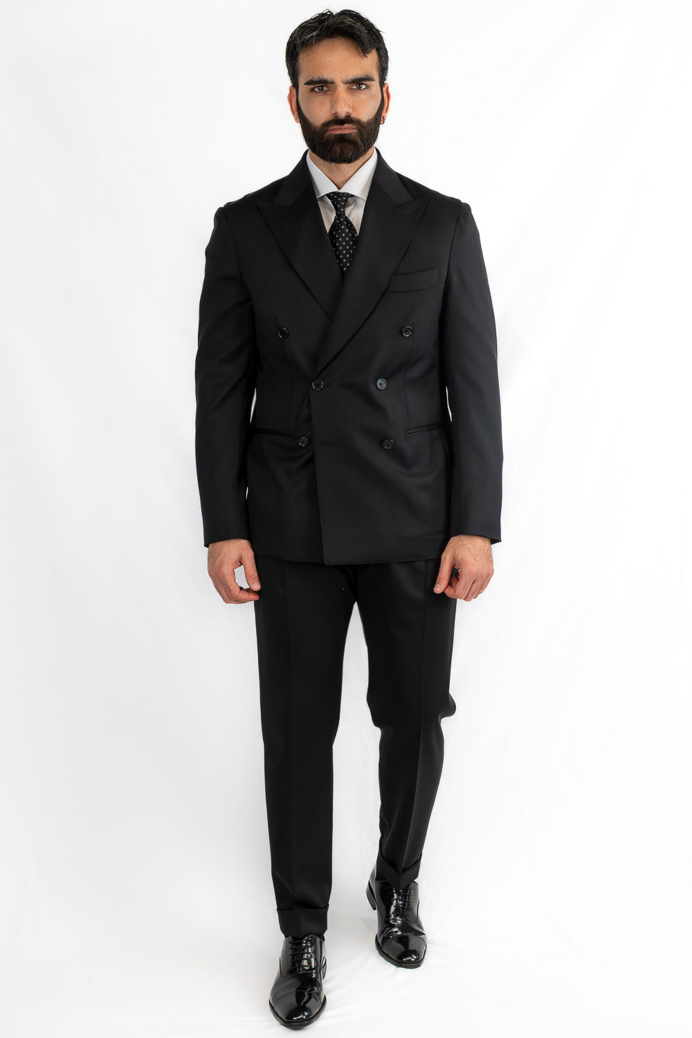 Abito nero doppiopetto uomo fresco lana super 130's  TessutiVitale Barberis Canonico completamente sfoderato con Rever a lancia e tasche a filetto