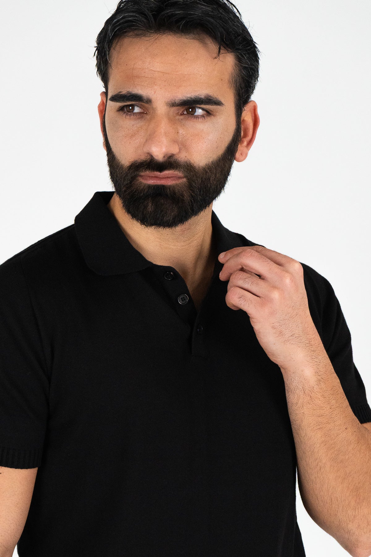 Polo mezze maniche Nero 100% cotone finezza 12 con elastici sulle maniche e sul fondo di filo tinta unita da uomo made in italy