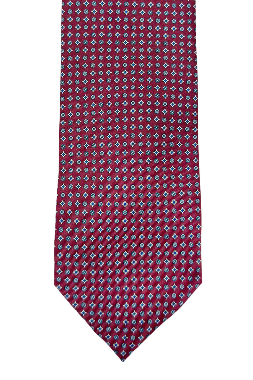 Cravatta uomo bordeaux fantasia 9cm in pura seta cucita a mano.