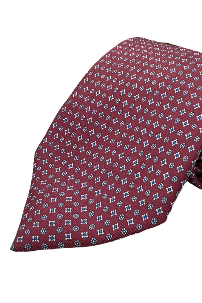 Cravatta uomo bordeaux fantasia 9cm in pura seta cucita a mano.