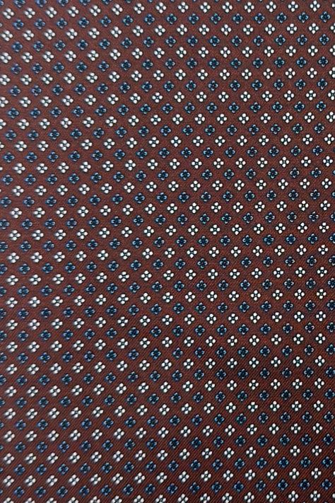Pochette uomo Marrone fantasia in seta con bordino in tinta