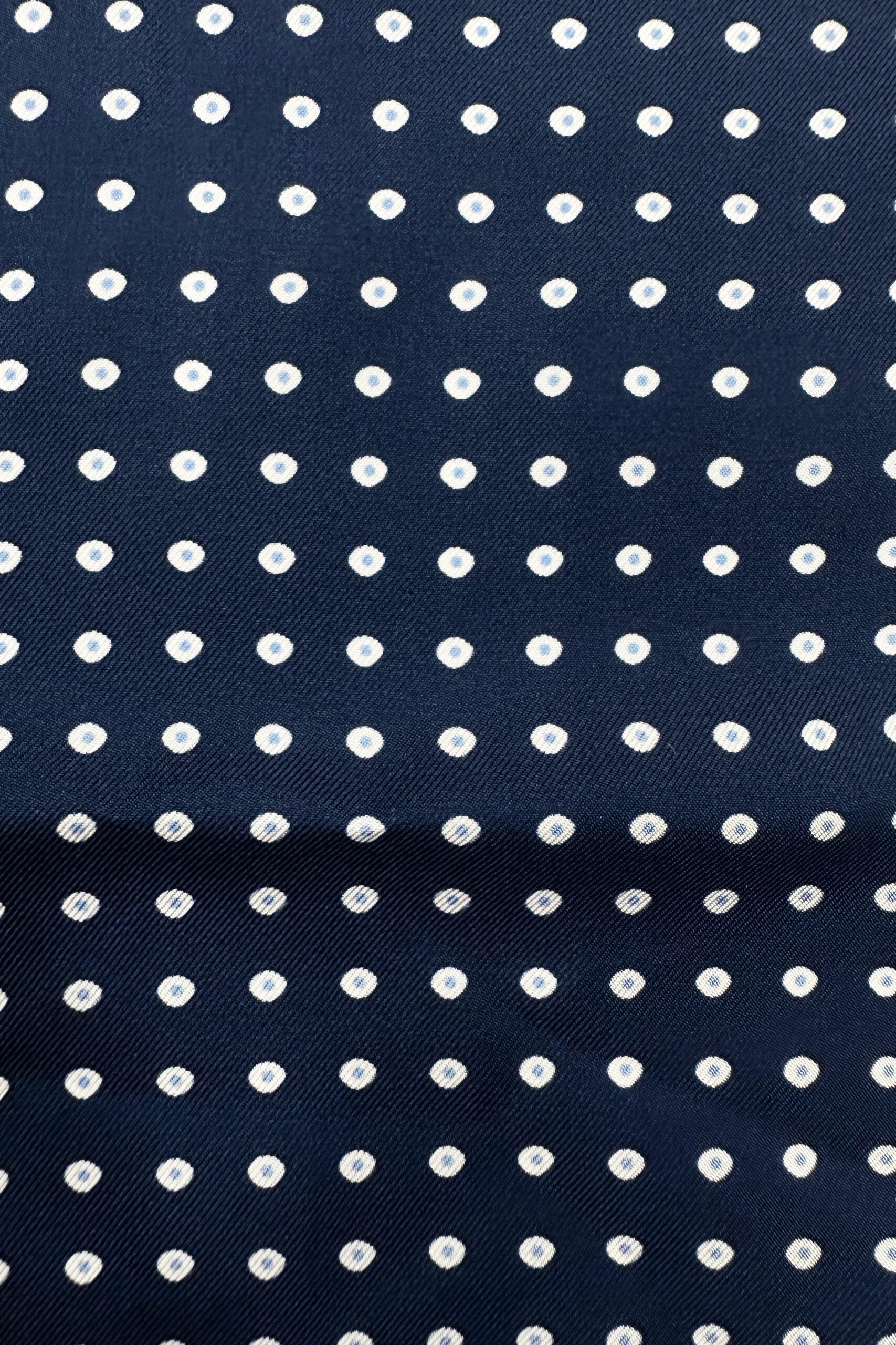 Pochette uomo blu fantasia in seta con bordino in tinta