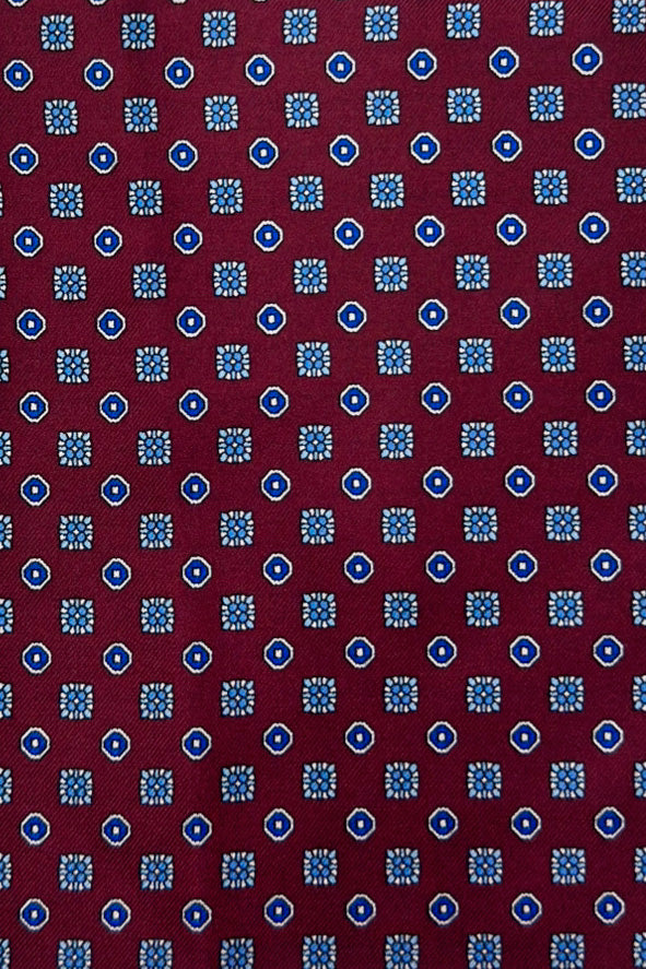Pochette uomo Bordeaux fantasia in seta con bordino in tinta