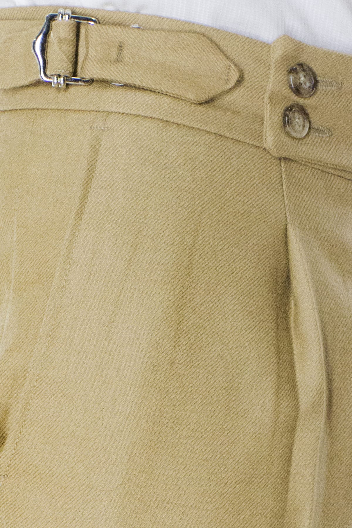Pantalone uomo corda in lana tinta unita vita alta con pinces fibbie laterali e risvolto 4cm