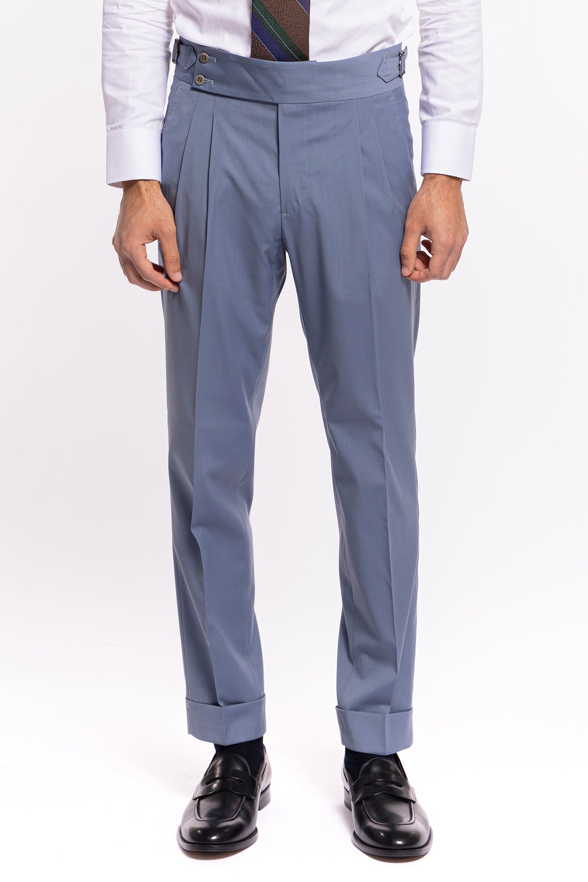 Pantalone uomo Celeste in fresco lana tinta unita vita alta con pinces fibbie laterali e risvolto 4cm