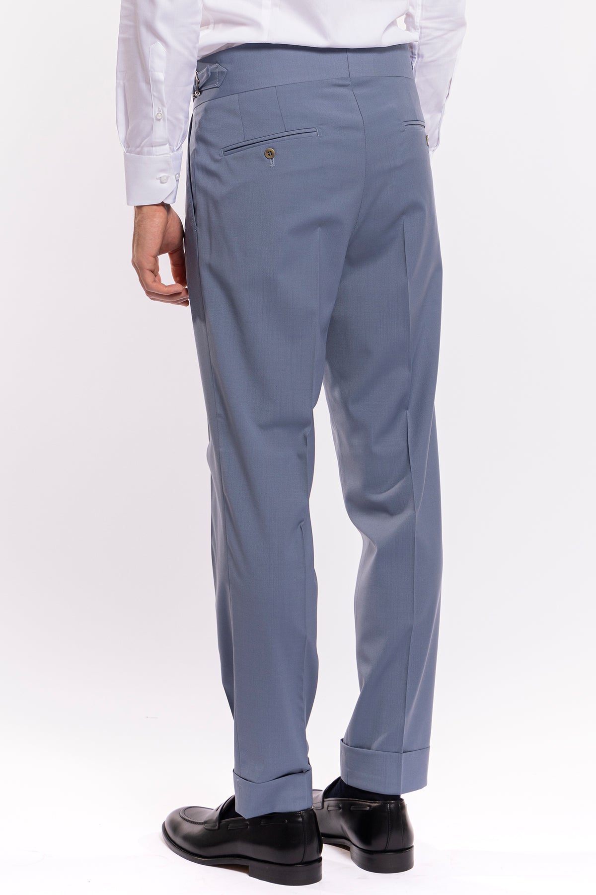 Pantalone uomo Celeste in fresco lana tinta unita vita alta con pinces fibbie laterali e risvolto 4cm