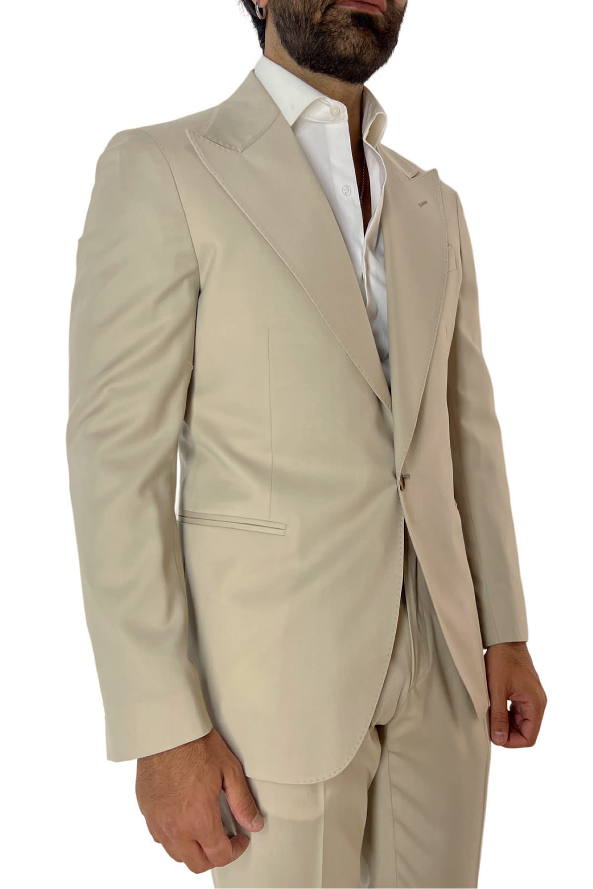 Giacca uomo monopetto beige in fresco lana super 130's con rever a lancia larga tasche a filo