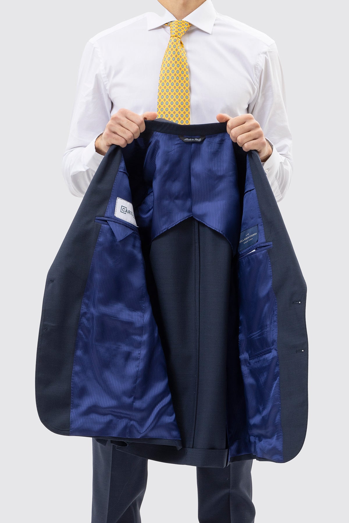 Giacca uomo monopetto blu pied de poule in fresco lana super 120's Holland & Sherry rever a lancia larga