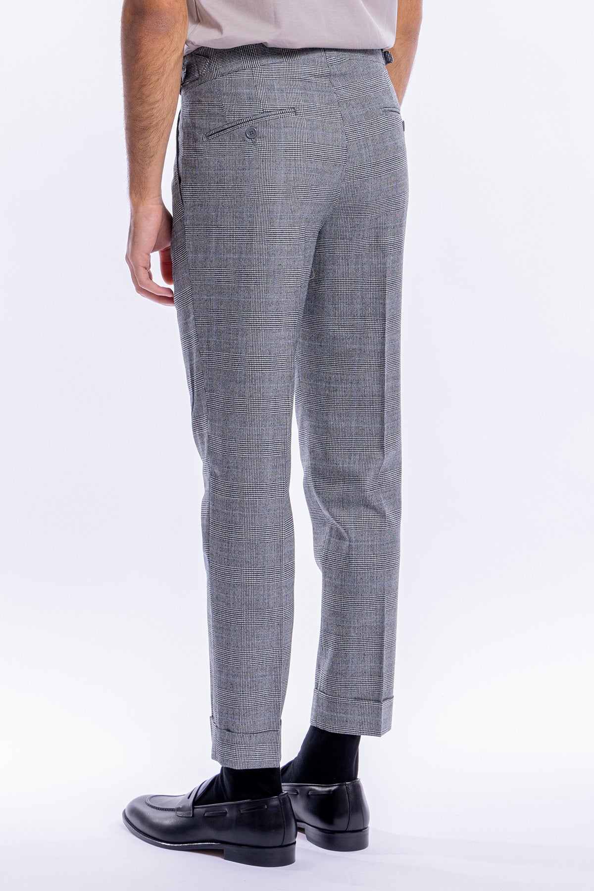 Pantalone uomo vita alta nero fantasia principe di galles tasca america in lana flanella Holland & Sherry con pinces e fibbie laterali