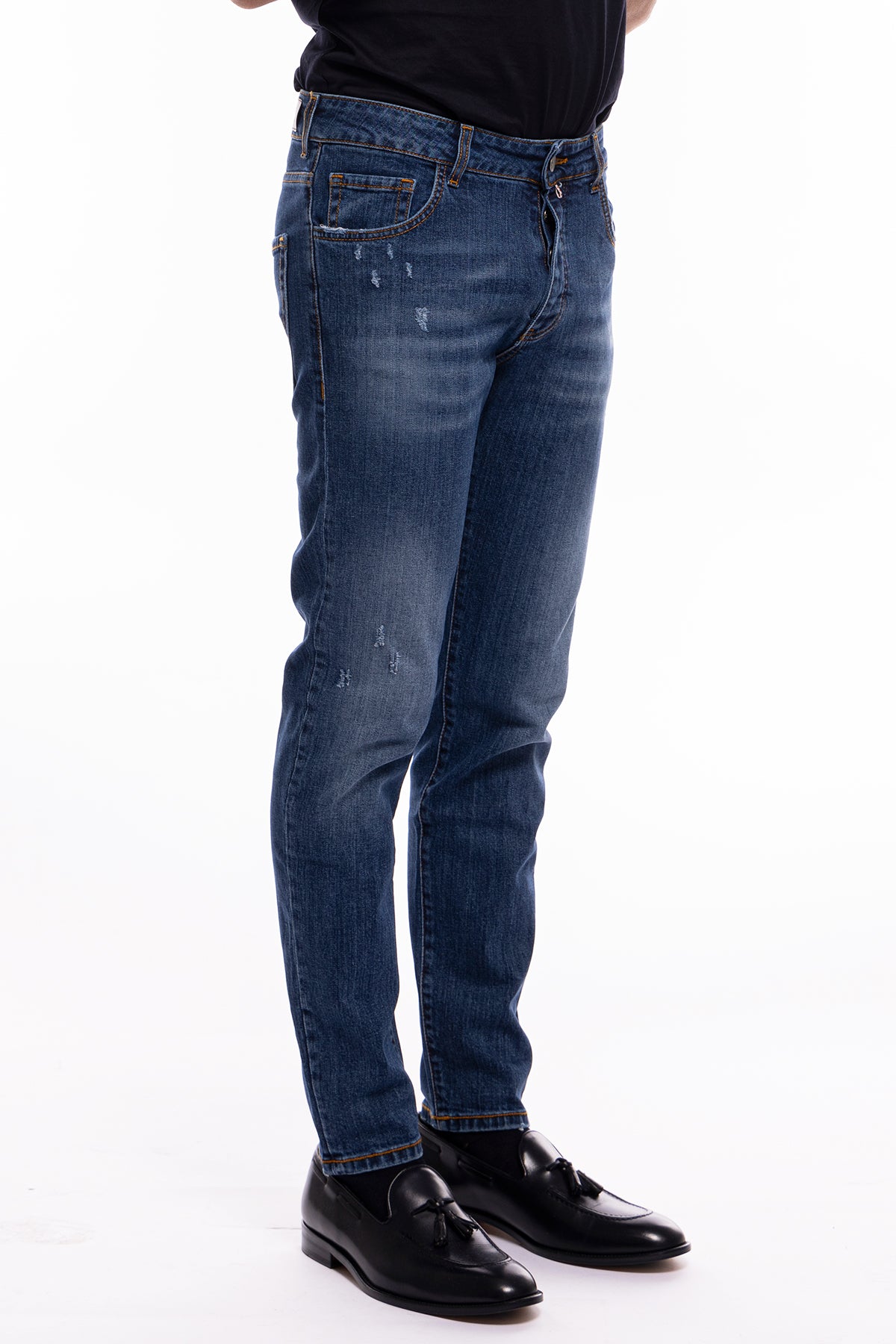 Jeans da uomo con strappi lavaggio medio con sabbiature bianche modello 5 tasche