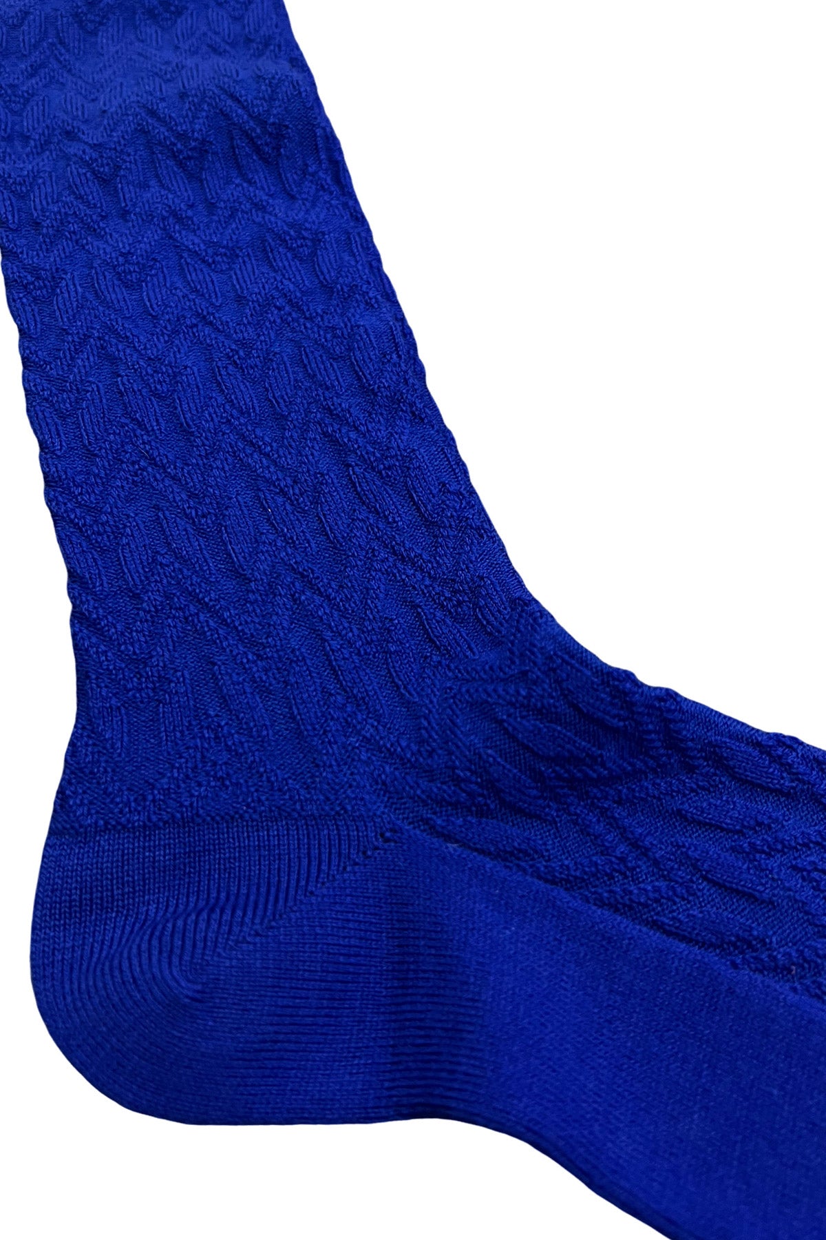 Calzini uomo lunghi royal blu in lana fantasia geometrica a rilievo con elastico verde made in italy