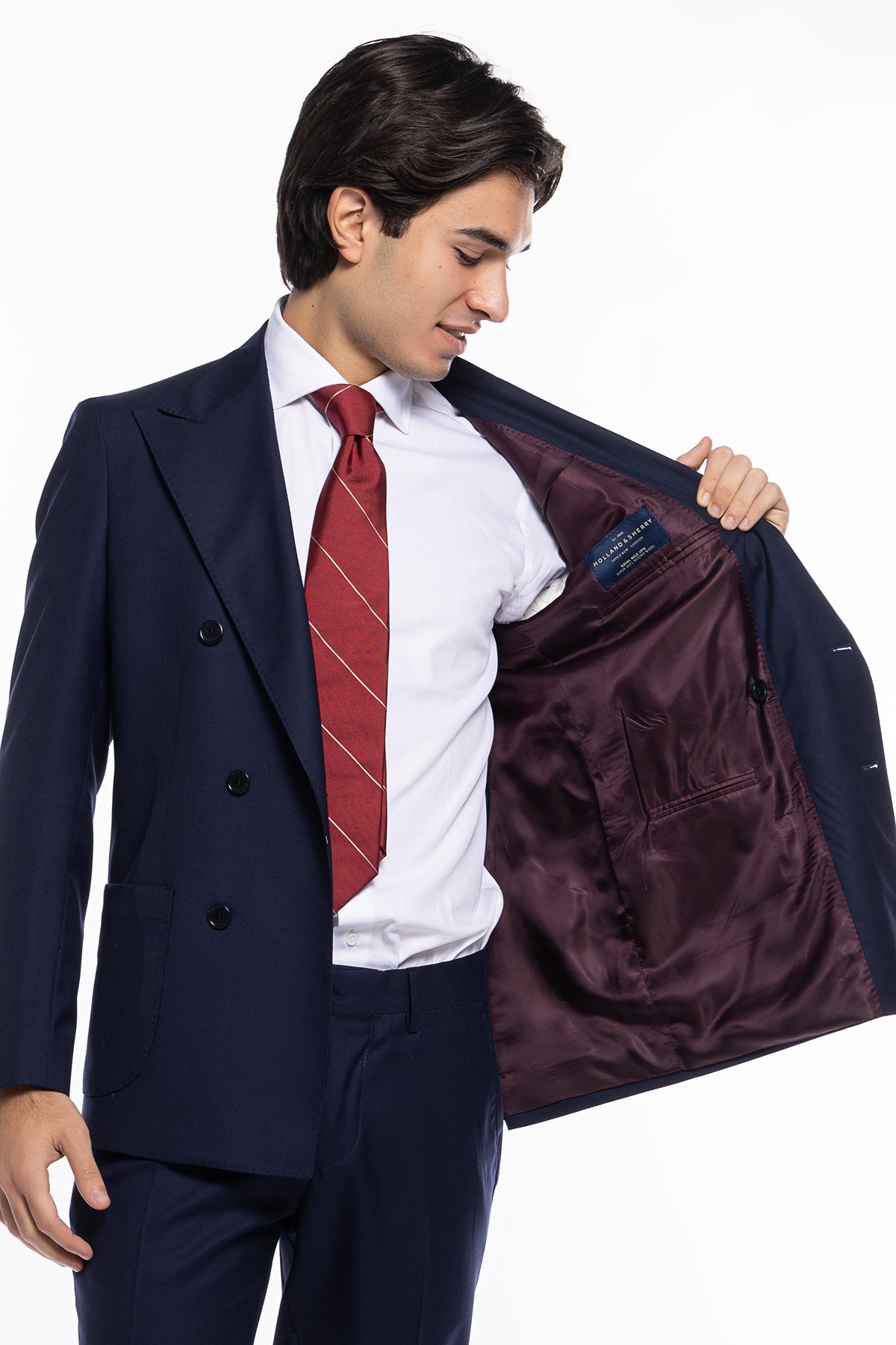 Giacca uomo doppiopetto Blu navy in fresco lana super 140's Holland & Sherry Rever a lancia e tasche a toppe
