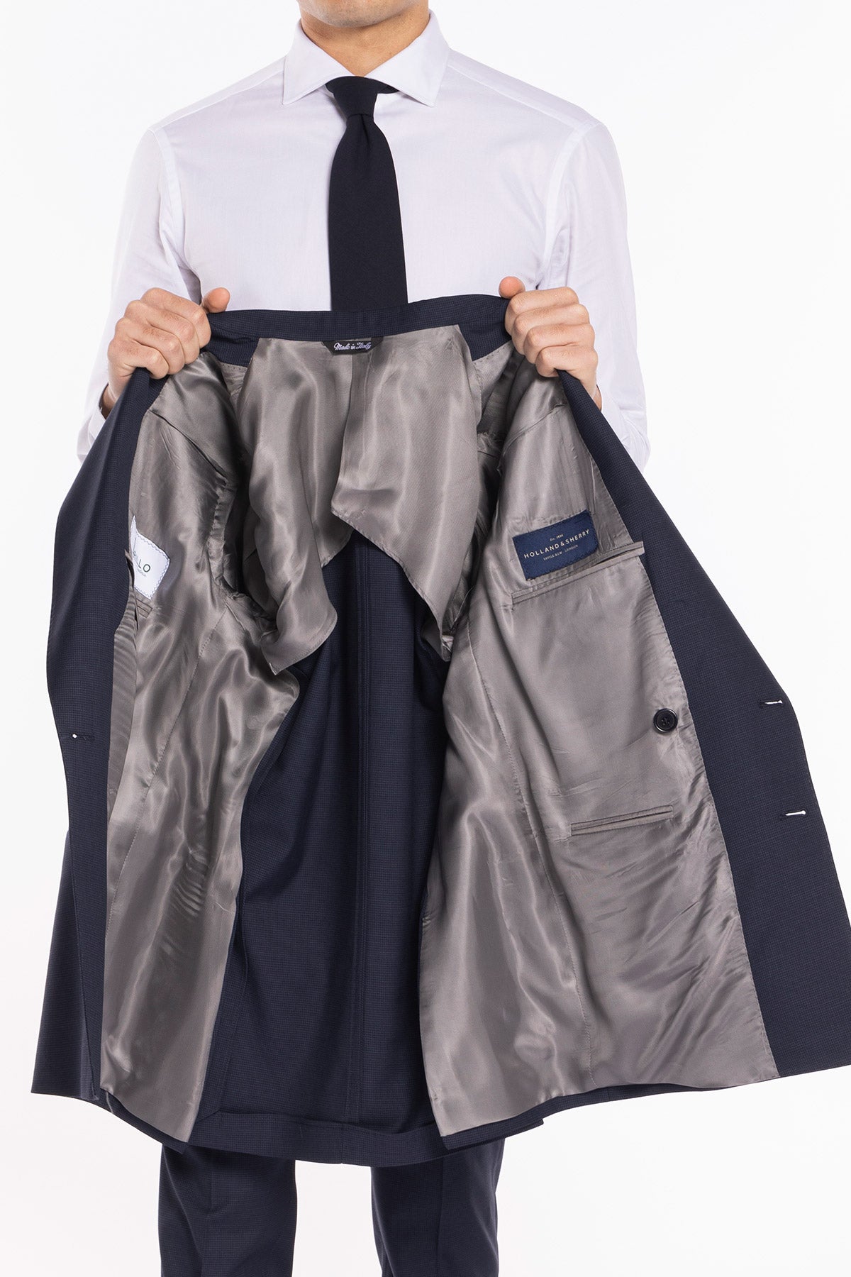 Abito uomo doppiopetto blu pied de poule in fresco lana super 120's Holland & Sherry rever a lancia larga