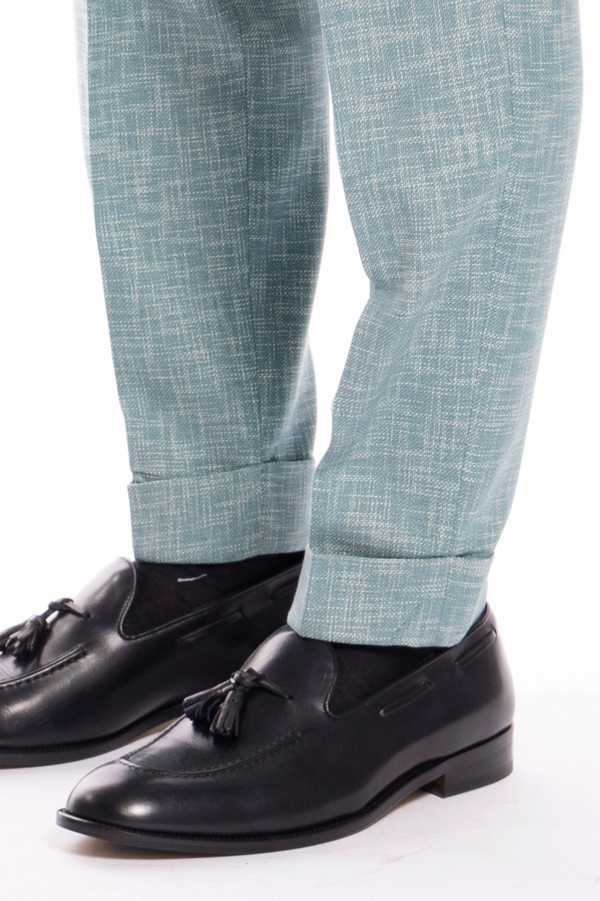 Pantalone uomo vita alta verde tiffany effetto melange misto lana e cotone Bristol Tessuti Napoli con fibbie laterali e doppia pinces .