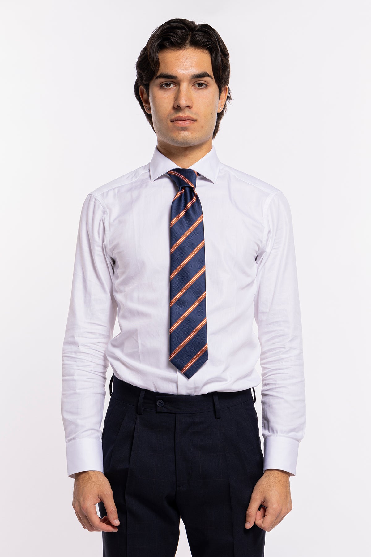 Cravatta uomo blu notte fantasia regimental riga diagonale arancio in seta 100% larghezza 8 cm da cerimonia elegante