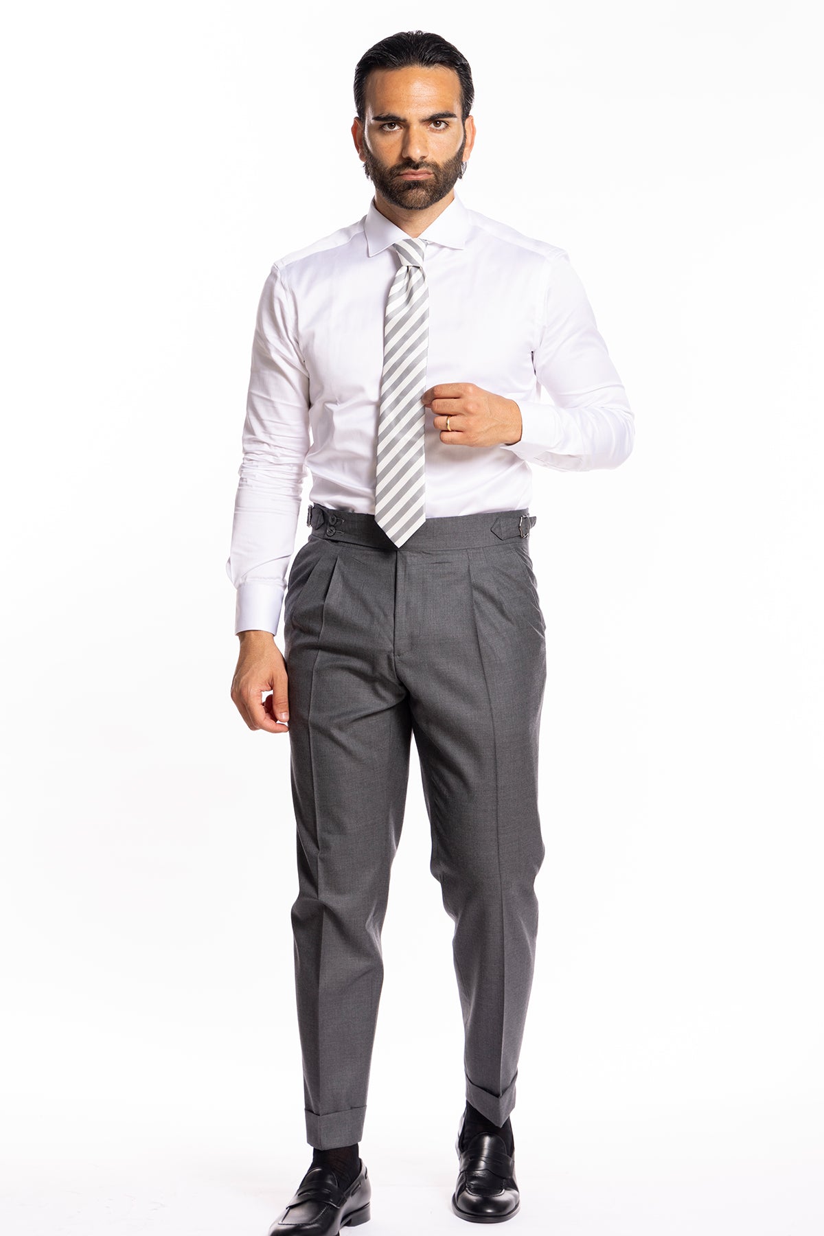 Pantalone uomo vita alta con fibbie laterali grigio medio fresco lana super 140's Holland & Sherry risvolto 5cm