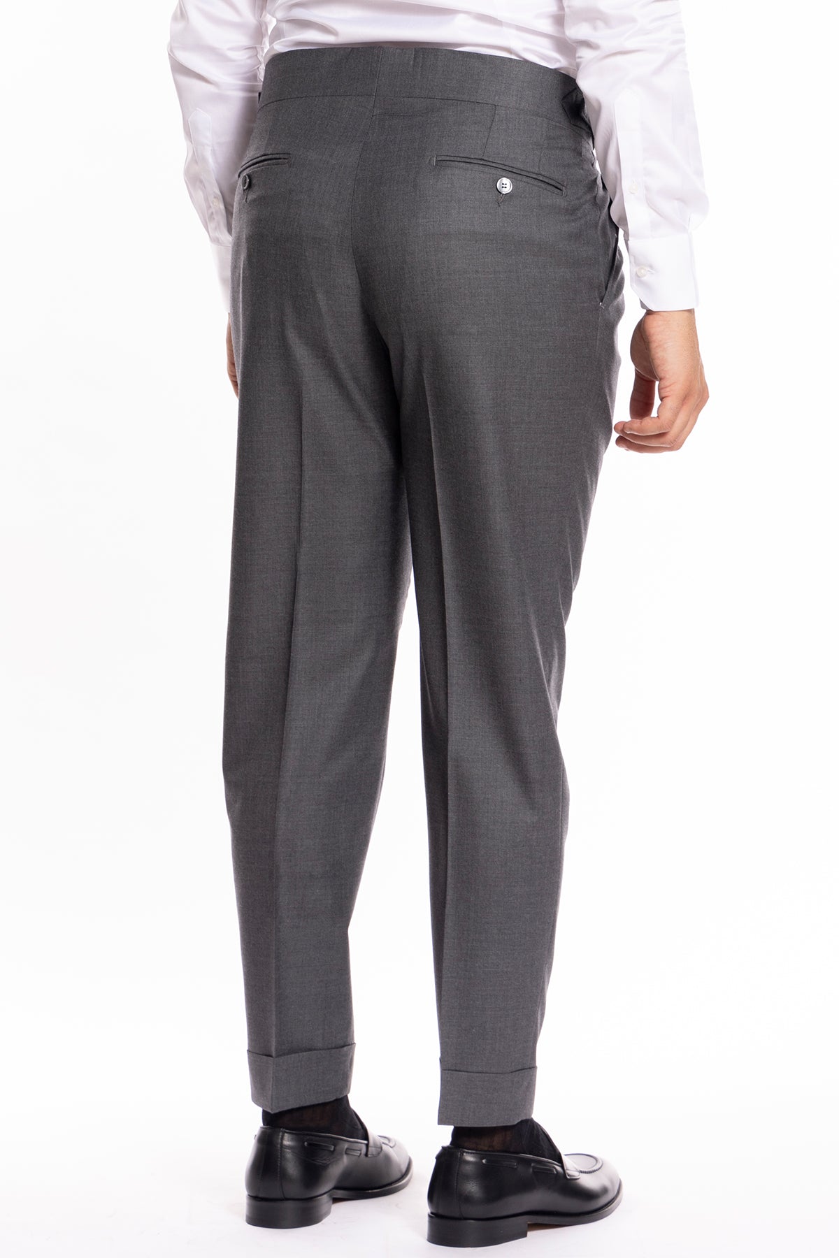 Pantalone uomo vita alta con fibbie laterali grigio medio fresco lana super 140's Holland & Sherry risvolto 5cm