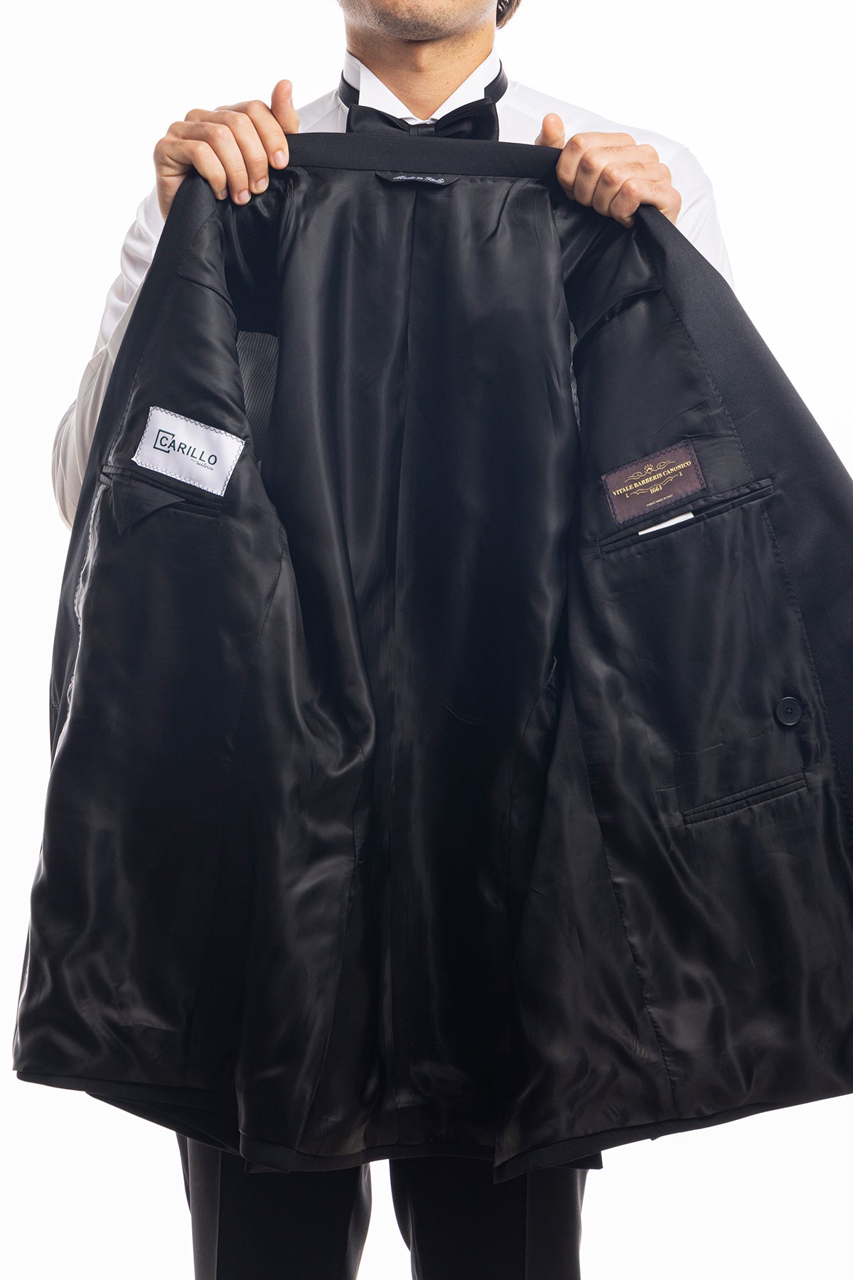 Abito smoking doppiopetto nera da uomo in fresco lana super 130's Vitale Barberis Canonico con rever a Lancia largo in raso