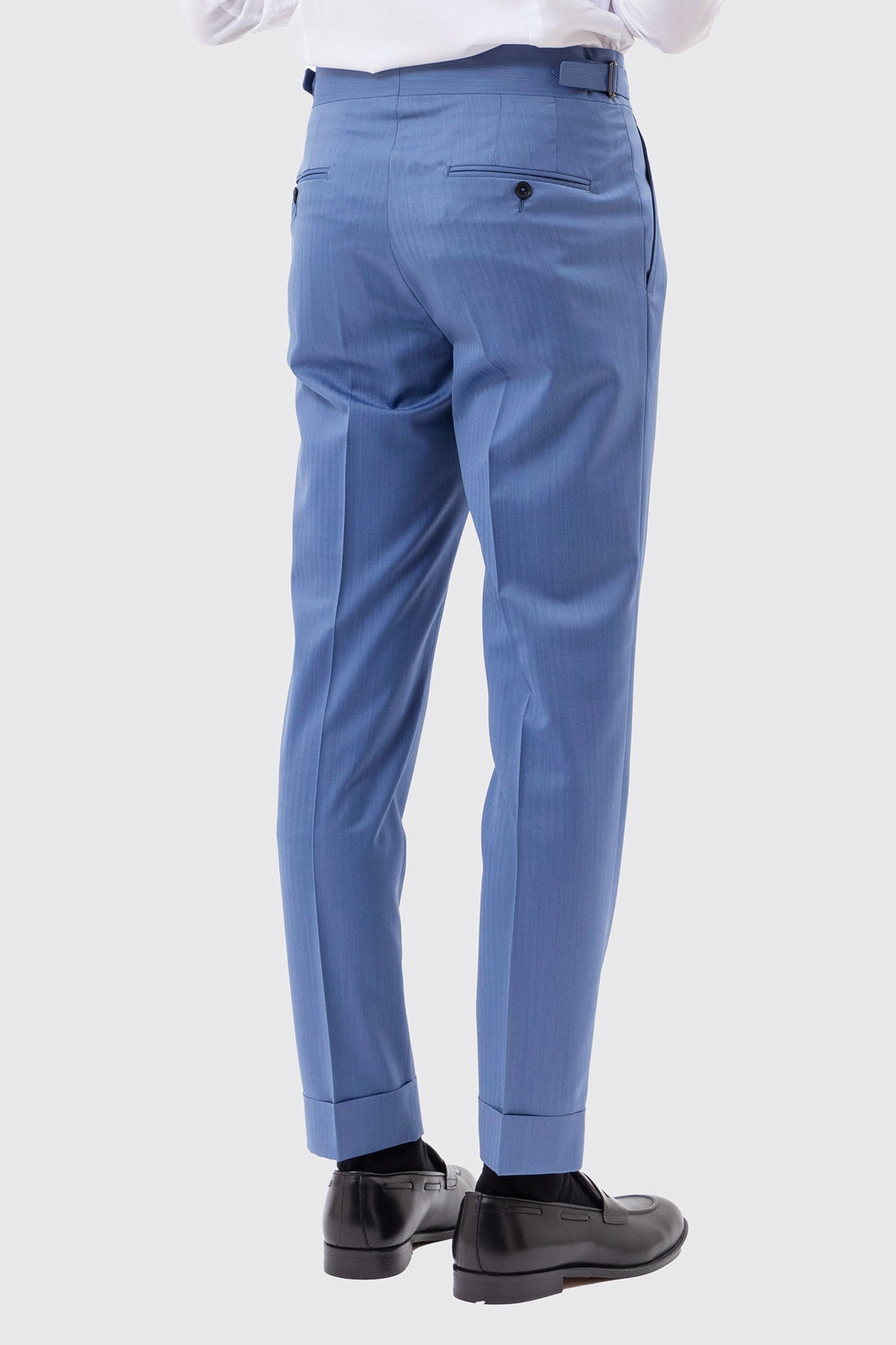 Pantalone uomo Celeste Solaro in fresco lana e seta Holland & Sherry vita alta con pinces fibbie laterali e risvolto 5cm