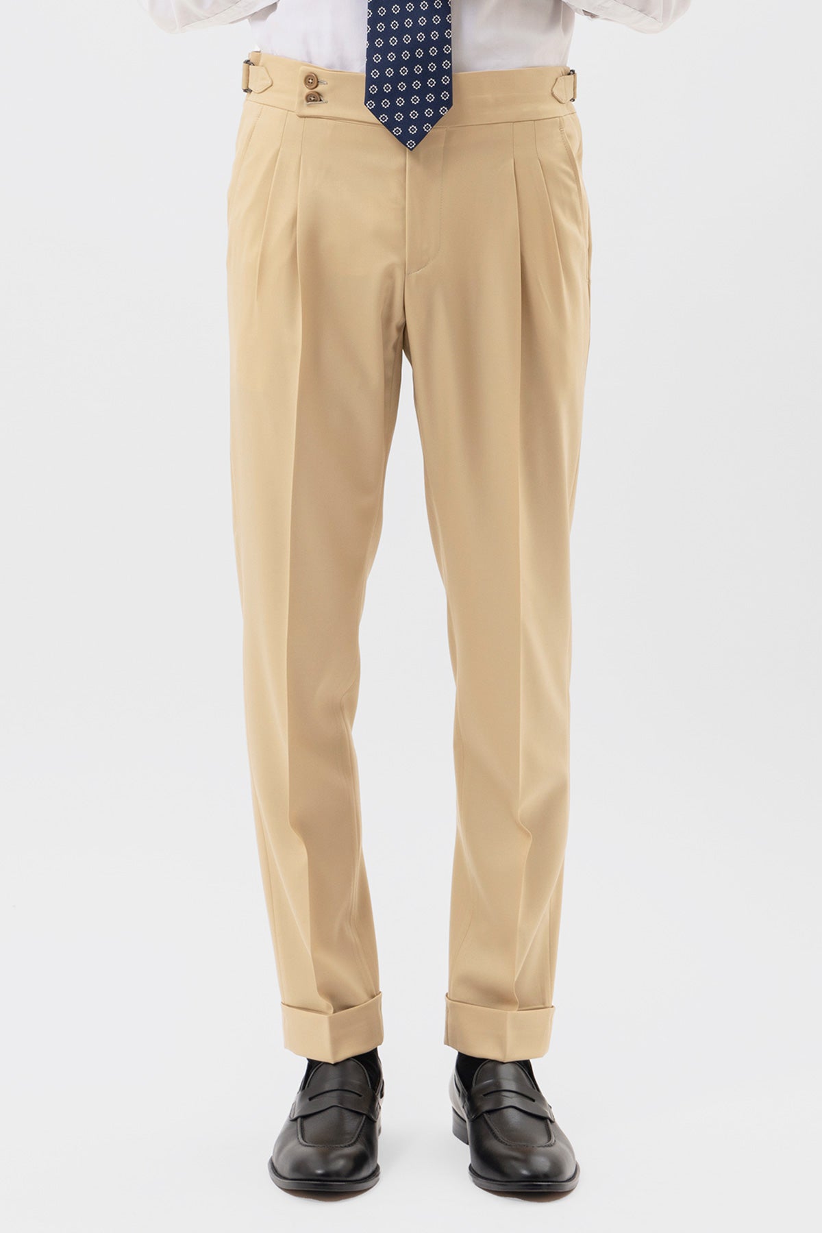 Pantalone uomo beige vita alta doppia pinces in fresco lana super 140's Holland & Sherry con fibbie laterali e risvolto 5cm