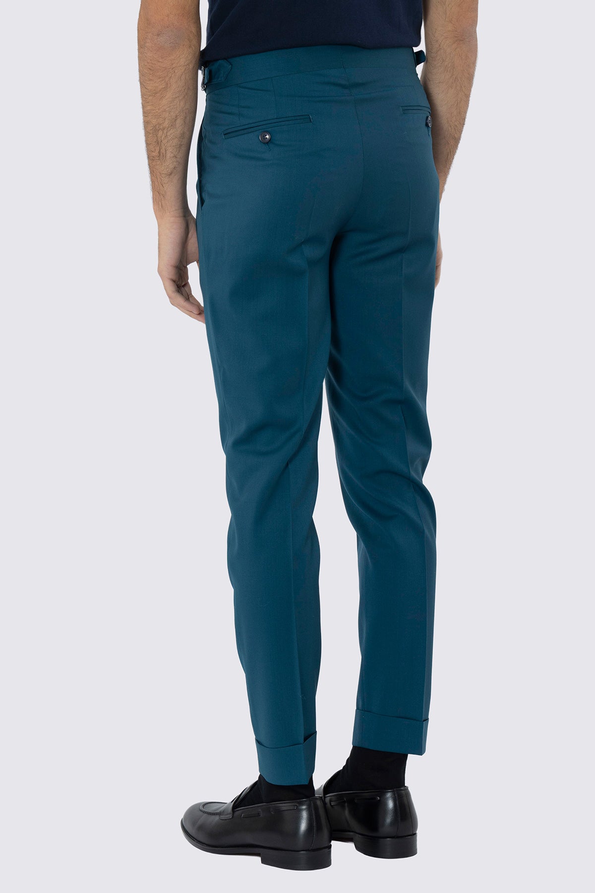 Pantalone uomo verde petrolio in fresco lana super 130's Bristol tessuti Napoli vita alta doppia pinces fibbie laterali e risvolto 5cm