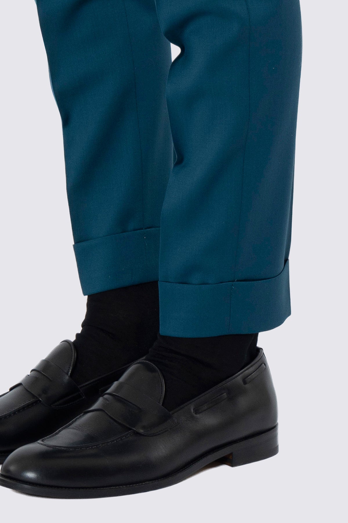 Pantalone uomo verde petrolio in fresco lana super 130's Bristol tessuti Napoli vita alta doppia pinces fibbie laterali e risvolto 5cm