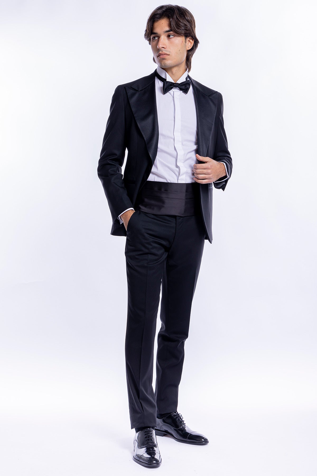 Abito smoking monopetto nera da uomo in fresco lana super 130's Vitale Barberis Canonico con rever a Lancia largo in raso