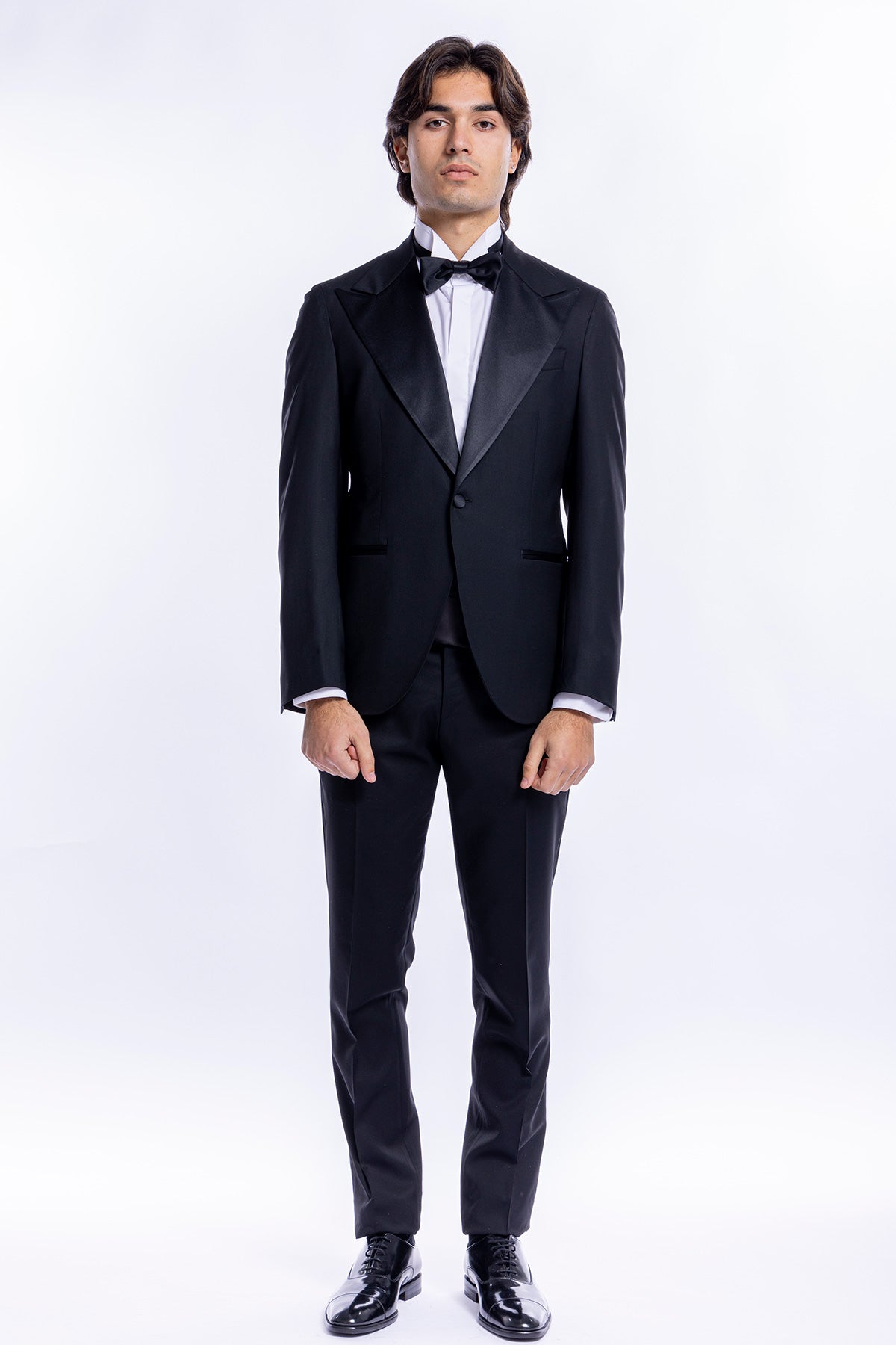 Abito smoking monopetto Nero da uomo in fresco lana super 160's Vitale Barberis Canonico con rever a Lancia largo in raso