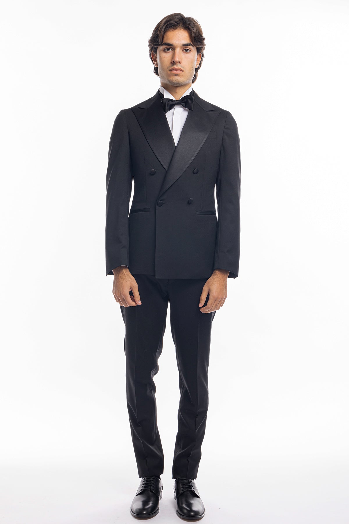 Abito smoking doppiopetto nera da uomo in fresco lana super 130's Vitale Barberis Canonico con rever a Lancia largo in raso