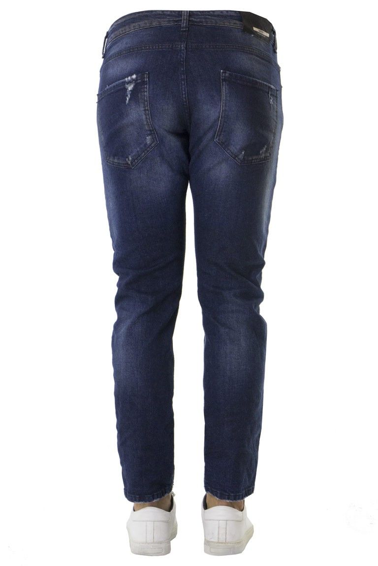 Jeans uomo slim elastico lavaggio scuro modello twist 5 tasche con rotture toppe ed effetto scambiato e sporco