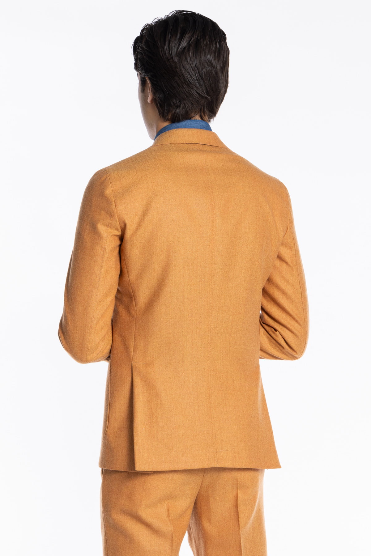 Abito uomo arancio spigato con giacca monopetto in pura lana Rever a lancia e tasche a toppe e pantalone vita alta con fibbie regolabili Holland & Sherry